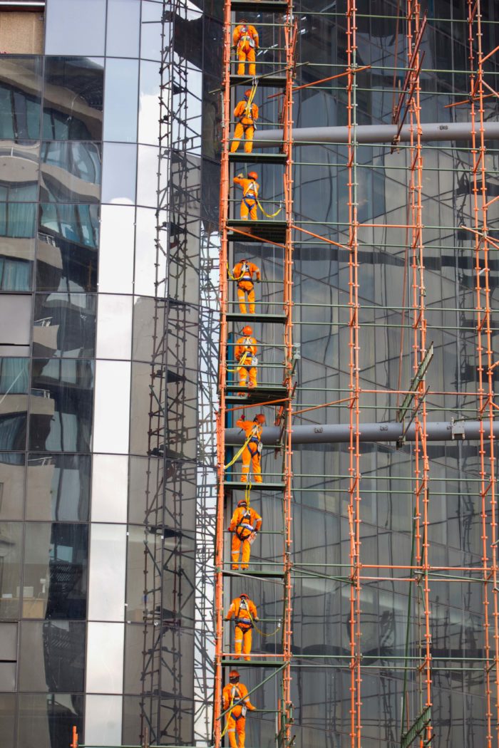 Workers building skyscraper